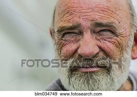 Stock Photo - Close up of wrinkled face of Caucasian man. Fotosearch