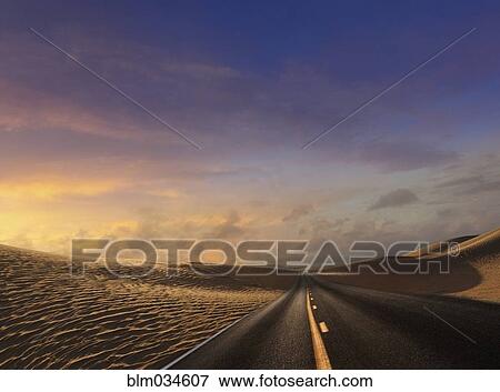 Empty road through desert sand dunes View Large Photo Image Stock Photo - Empty road through desert sand dunes. Fotosearch