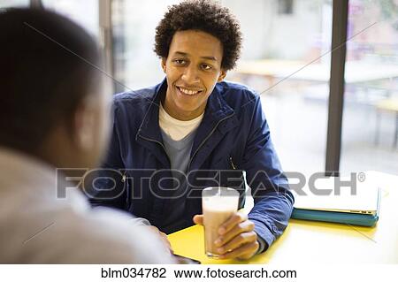 Men drinking coffee in cafe View Large Photo Image Stock Image - Men drinking coffee in cafe. Fotosearch