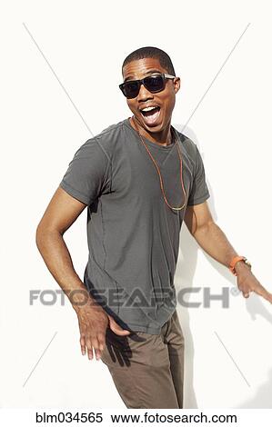 Stylish man in sunglasses dancing View Large Photo Image Stock Photography - Stylish man in sunglasses dancing. Fotosearch