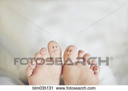 Toes of Caucasian girl with smiley face drawings View Large Photo Image Stock Image - Toes of Caucasian girl with smiley face drawings. Fotosearch