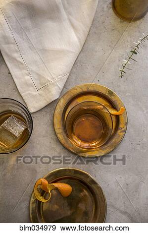 Stock Photo - Variety of cocktails on gold platters. Fotosearch