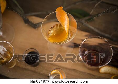 Stock Photo - Variety of cocktails on wooden board. Fotosearch