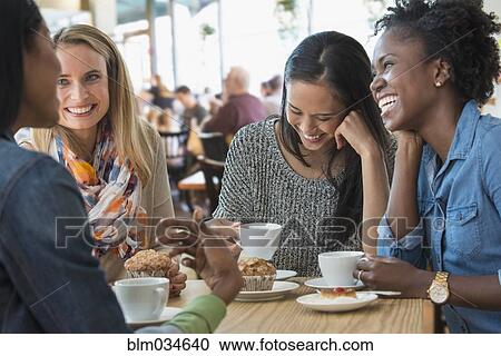 Women eating breakfast in cafe View Large Photo Image Stock Image - Women eating breakfast in cafe. Fotosearch
