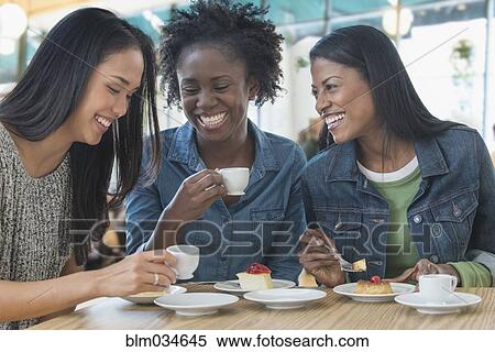 Women laughing with dessert cafe View Large Photo Image Stock Photography - Women laughing with dessert cafe. Fotosearch