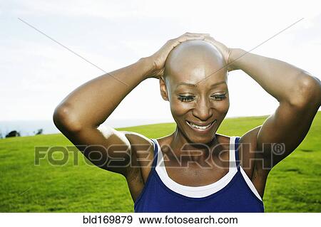 African American woman smiling in park View Large Photo Image Stock Photo - African American woman smiling in park. Fotosearch