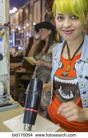 Caucasian artist using heat gun in workshop View Large Photo Image Picture - Caucasian artist using heat gun in workshop. Fotosearch