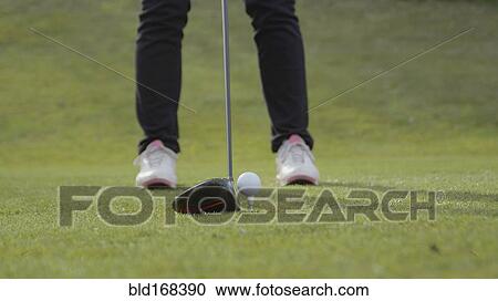 Caucasian woman teeing off on golf course View Large Photo Image Stock Image - Caucasian woman teeing off on golf course. Fotosearch