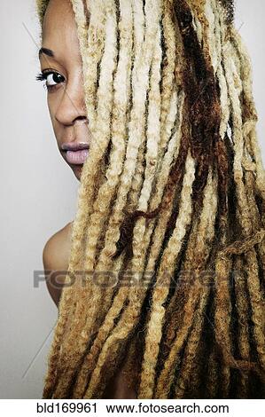 Close up of Black woman with dreadlocks View Large Photo Image Stock Image - Close up of Black woman with dreadlocks. Fotosearch