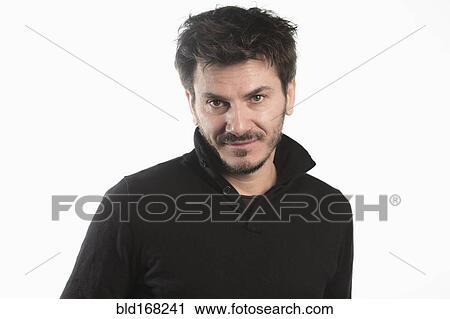 Stock Image - Close up of Caucasian man smiling. Fotosearch