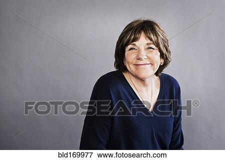 Close up of Caucasian woman smiling View Large Photo Image Stock Photo - Close up of Caucasian woman smiling. Fotosearch