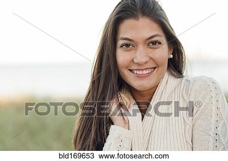 Close up of Hispanic woman smiling View Large Photo Image Stock Image - Close up of Hispanic woman smiling. Fotosearch