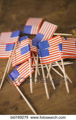 Stock Photo - Close up of pile of American flags. Fotosearch