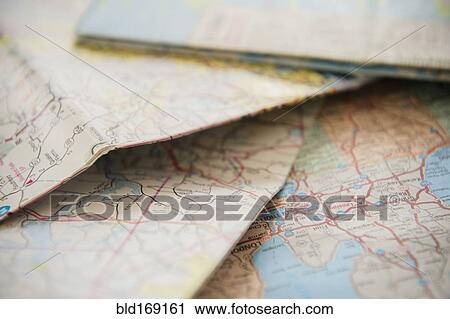 Close up of pile of roadmaps View Large Photo Image Stock Image - Close up of pile of roadmaps. Fotosearch