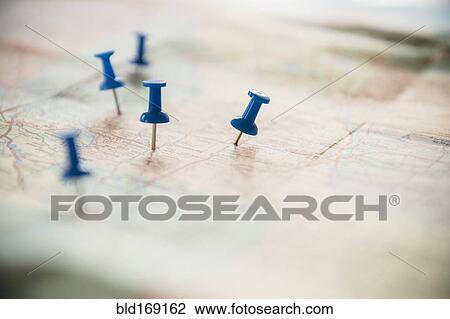 Close up of pushpins on roadmap route View Large Photo Image Stock Image - Close up of pushpins on roadmap route. Fotosearch