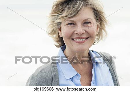 Close up of smiling Caucasian woman View Large Photo Image Stock Photograph - Close up of smiling Caucasian woman. Fotosearch