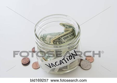 Close up of vacation savings jar View Large Photo Image Stock Photo - Close up of vacation savings jar. Fotosearch
