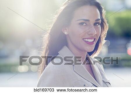 Hispanic businesswoman smiling outdoors View Large Photo Image Stock Image - Hispanic businesswoman smiling outdoors. Fotosearch