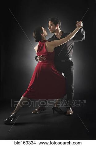 Picture - Hispanic salsa dancers performing. Fotosearch