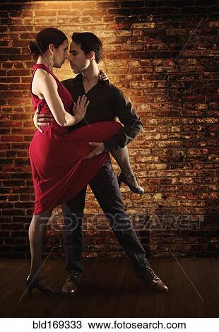 Stock Image - Hispanic salsa dancers performing. Fotosearch