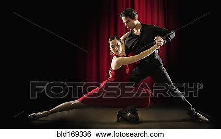Stock Photograph - Hispanic salsa dancers performing. Fotosearch