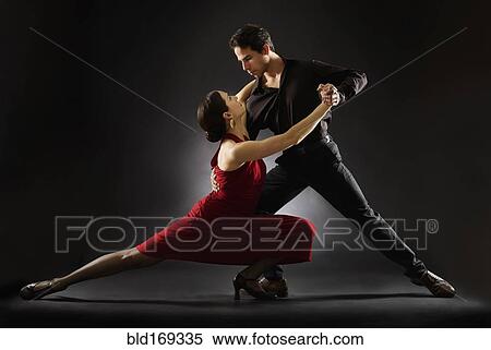 Stock Photography - Hispanic salsa dancers performing. Fotosearch