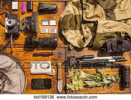 Stock Photograph - Photography equipment on table. Fotosearch