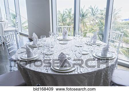 Set table at window in restaurant View Large Photo Image Stock Photo - Set table at window in restaurant. Fotosearch