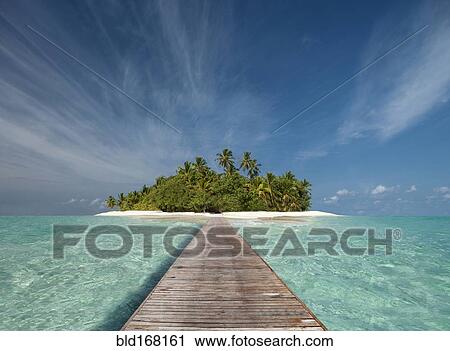 Wooden dock walkway to tropical island View Large Photo Image Stock Image - Wooden dock walkway to tropical island. Fotosearch