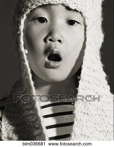 Asian girl wearing knitted cap View Large Photo Image Stock Image - Asian girl wearing knitted cap. Fotosearch