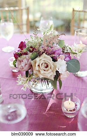 Bouquet of flowers in vase on pink tablecloth View Large Photo Image Stock Photo - Bouquet of flowers in vase on pink tablecloth. Fotosearch