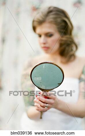 Bride admiring herself in mirror View Large Photo Image Stock Photograph - Bride admiring herself in mirror. Fotosearch