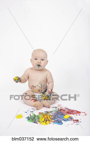 Caucasian baby playing with paint View Large Photo Image Stock Image - Caucasian baby playing with paint. Fotosearch