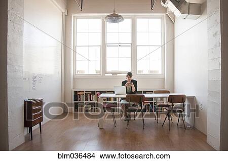 Caucasian businesswoman working on laptop in office View Large Photo Image Picture - Caucasian businesswoman working on laptop in office. Fotosearch