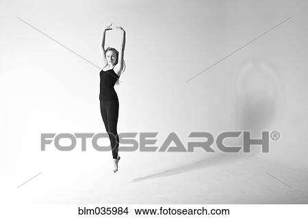 Caucasian dancer jumping for joy View Large Photo Image Picture - Caucasian dancer jumping for joy. Fotosearch