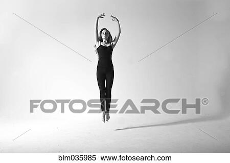 Caucasian dancer jumping for joy View Large Photo Image Stock Photography - Caucasian dancer jumping for joy. Fotosearch
