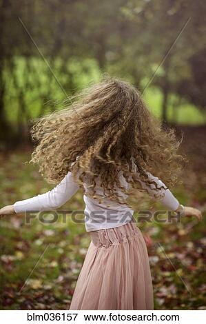 Caucasian girl playing in autumn leaves View Large Photo Image Stock Photo - Caucasian girl playing in autumn leaves. Fotosearch