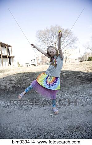 Caucasian girl playing in park View Large Photo Image Picture - Caucasian girl playing in park. Fotosearch