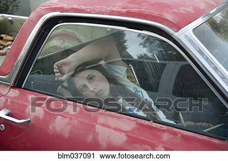 Caucasian girl sitting in vintage truck View Large Photo Image Stock Image - Caucasian girl sitting in vintage truck. Fotosearch