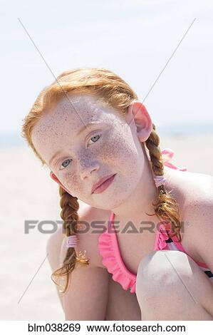Caucasian girl wearing bathing suit on beach View Large Photo Image Stock Photo - Caucasian girl wearing bathing suit on beach. Fotosearch