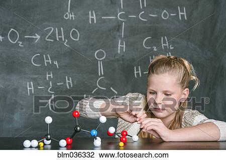 Caucasian student building molecular model in science class View Large Photo Image Stock Image - Caucasian student building molecular model in science class. Fotosearch