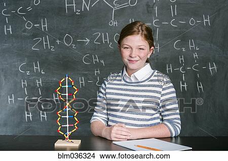 Caucasian student with molecular model in science class View Large Photo Image Picture - Caucasian student with molecular model in science class. Fotosearch