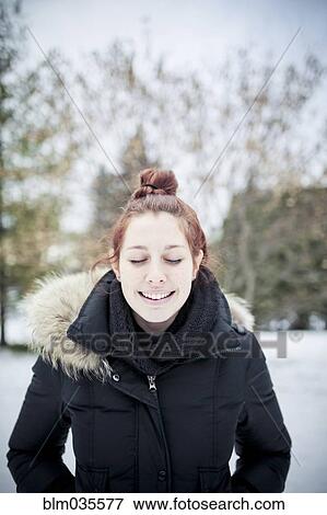 Caucasian teenage girl wearing parka outdoors View Large Photo Image Stock Photo - Caucasian teenage girl wearing parka outdoors. Fotosearch
