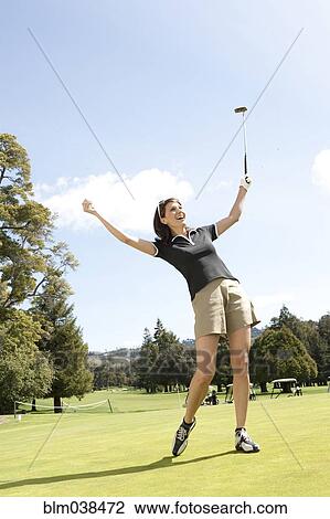 Caucasian woman cheering on golf course View Large Photo Image Stock Image - Caucasian woman cheering on golf course. Fotosearch