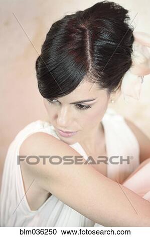 Caucasian woman looking over her shoulder View Large Photo Image Stock Image - Caucasian woman looking over her shoulder. Fotosearch