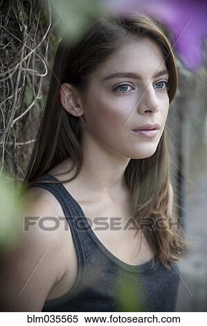 Caucasian woman near vines View Large Photo Image Stock Photography - Caucasian woman near vines. Fotosearch