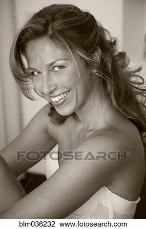 Caucasian woman smiling View Large Photo Image Stock Image - Caucasian woman smiling. Fotosearch