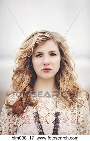 Stock Photo - Caucasian woman standing outdoors. Fotosearch