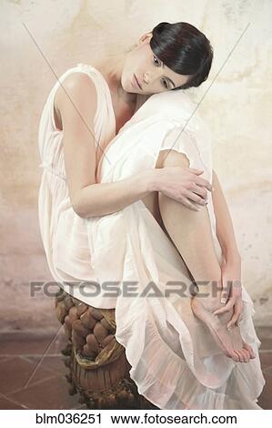 Caucasian woman wearing flowing gown View Large Photo Image Stock Image - Caucasian woman wearing flowing gown. Fotosearch