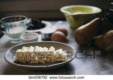 Close up of baking ingredients and pears on marble counter View Large Photo Image Stock Image - Close up of baking ingredients and pears on marble counter. Fotosearch